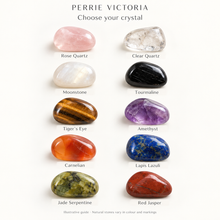Load image into Gallery viewer, Crystal choices: Rose Quartz, Clear Quartz, Moonstone, Tourmaline, Tiger’s Eye, Amethyst, Carnelian, Lapis Lazuli, Jade Serpentine and Red Jasper.